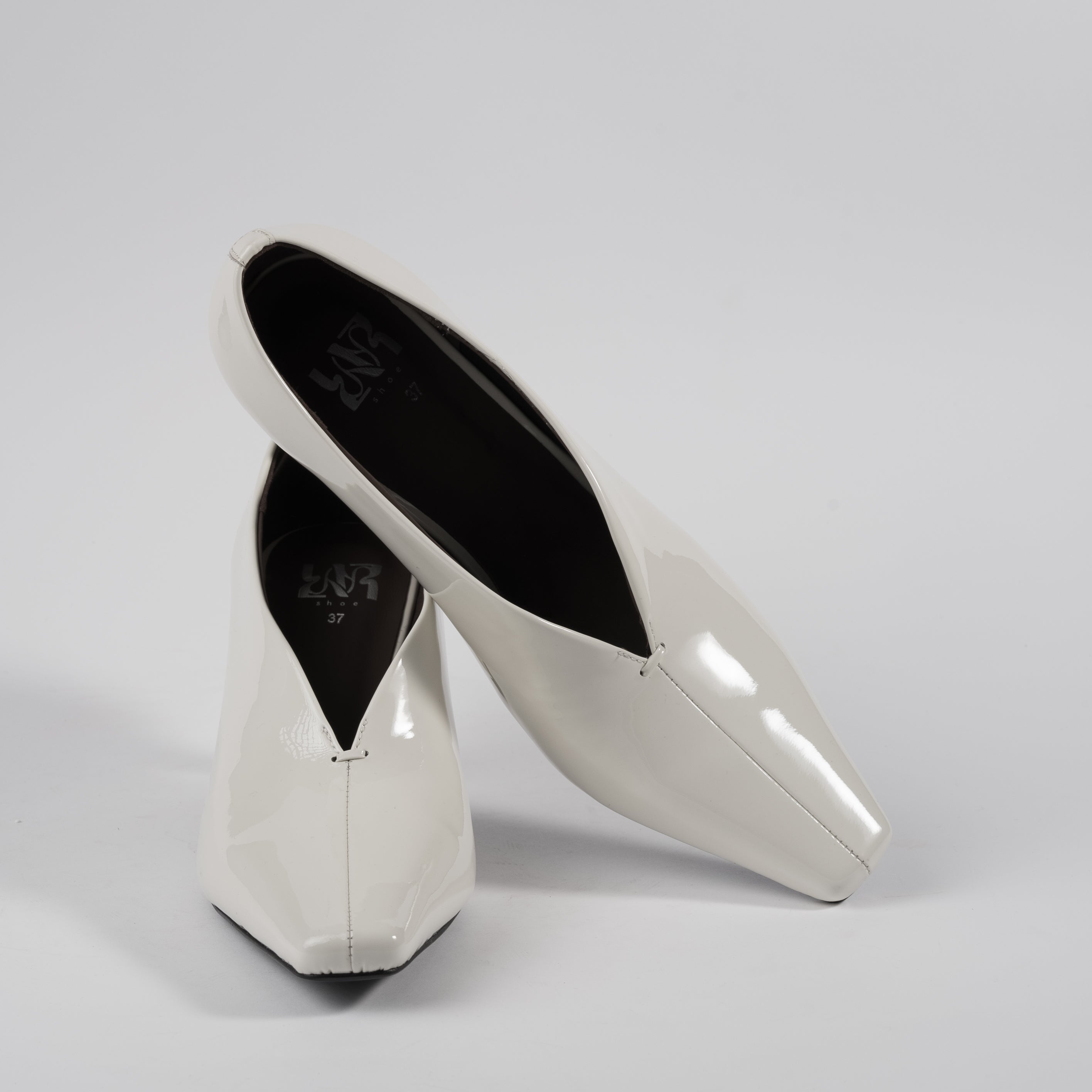 White Renèeh Pumps