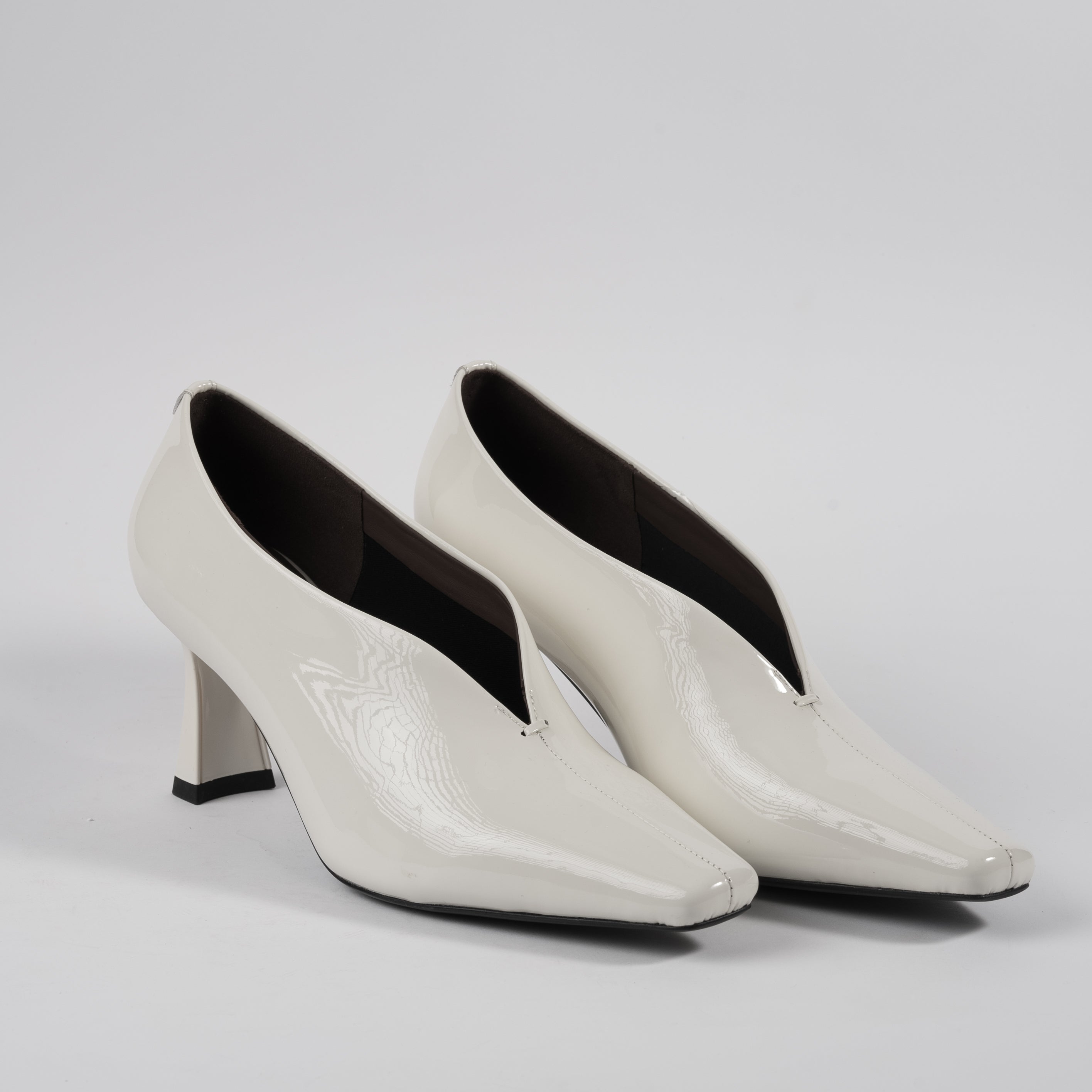 White Renèeh Pumps