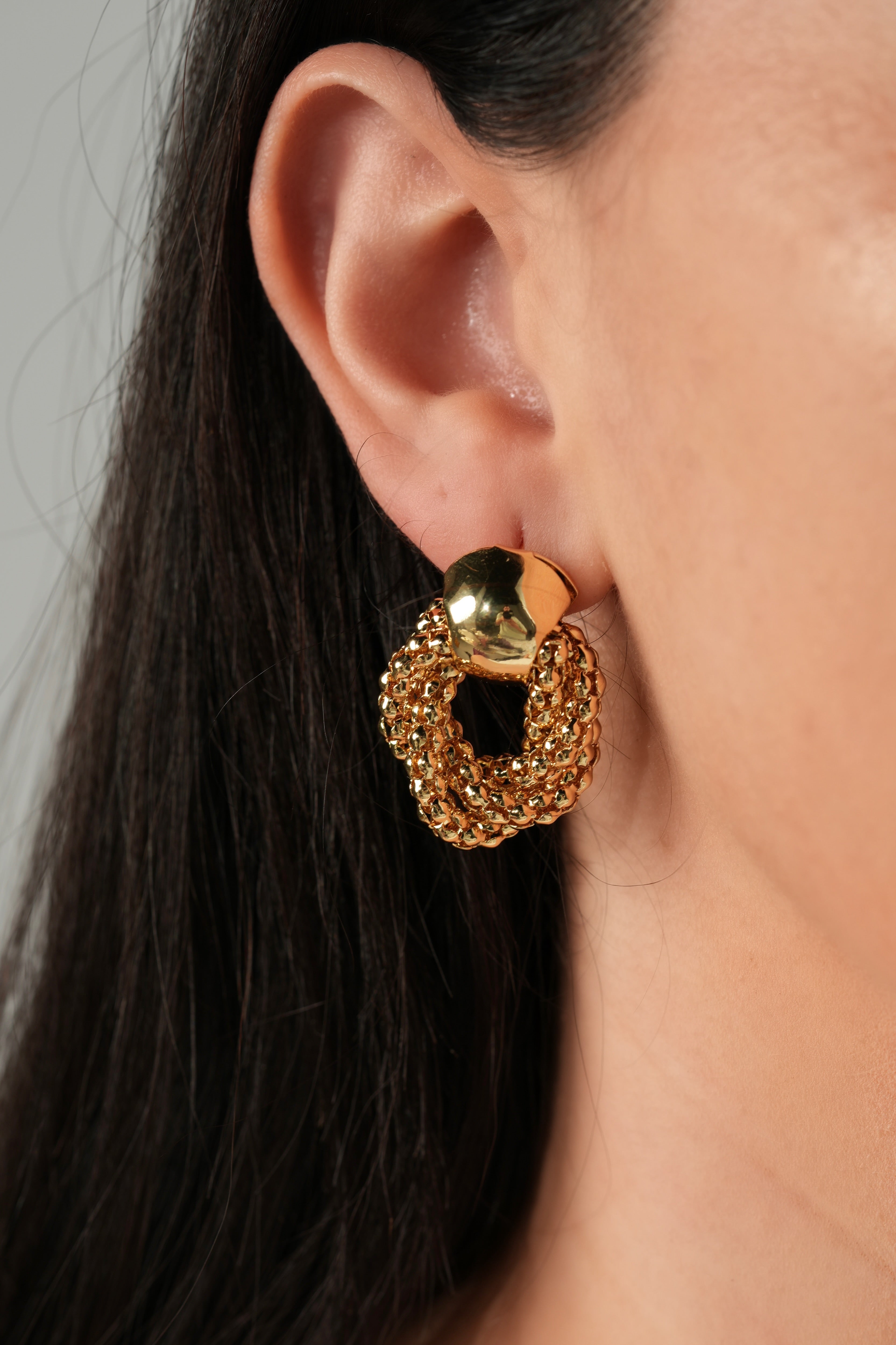 Golden circled earrings