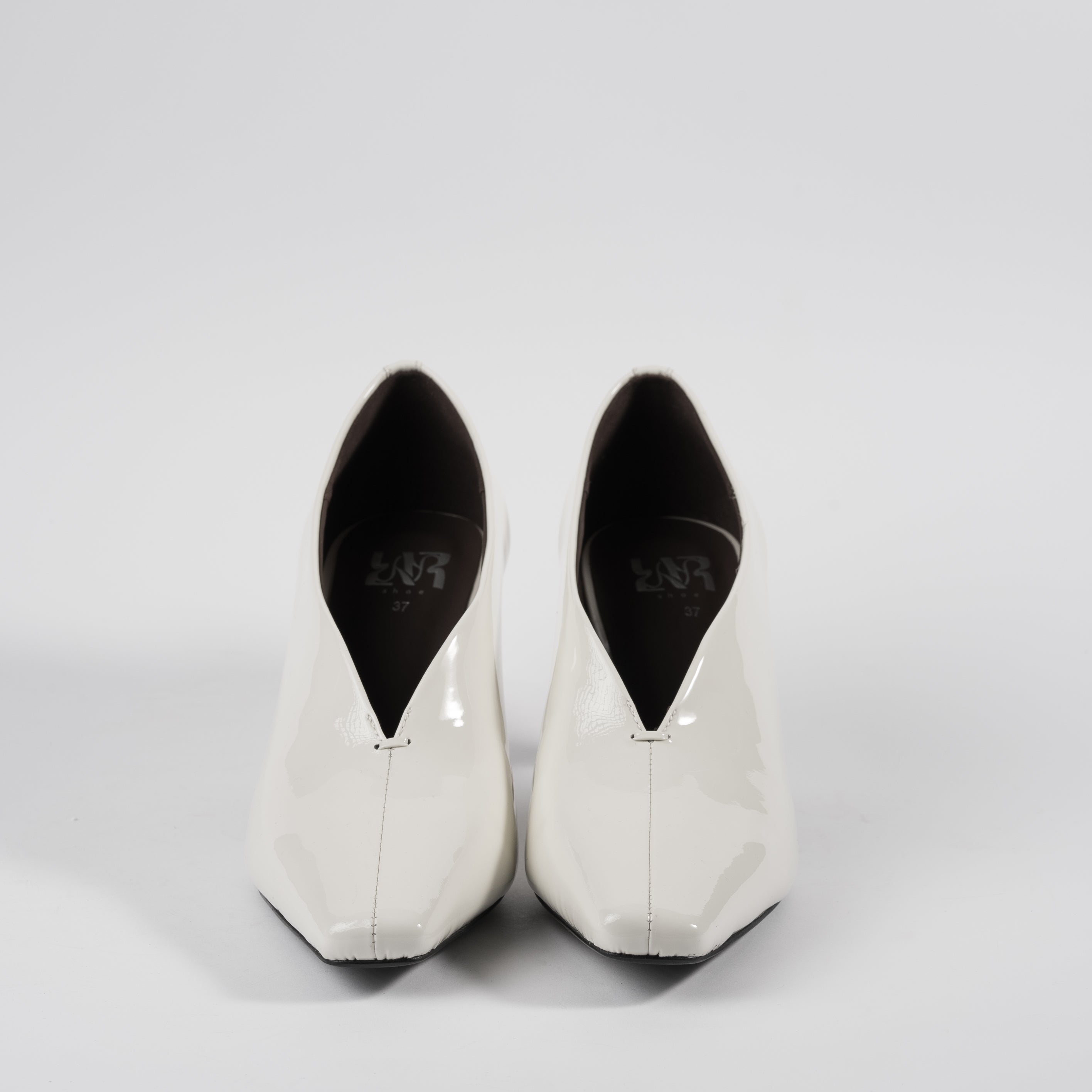 White Renèeh Pumps