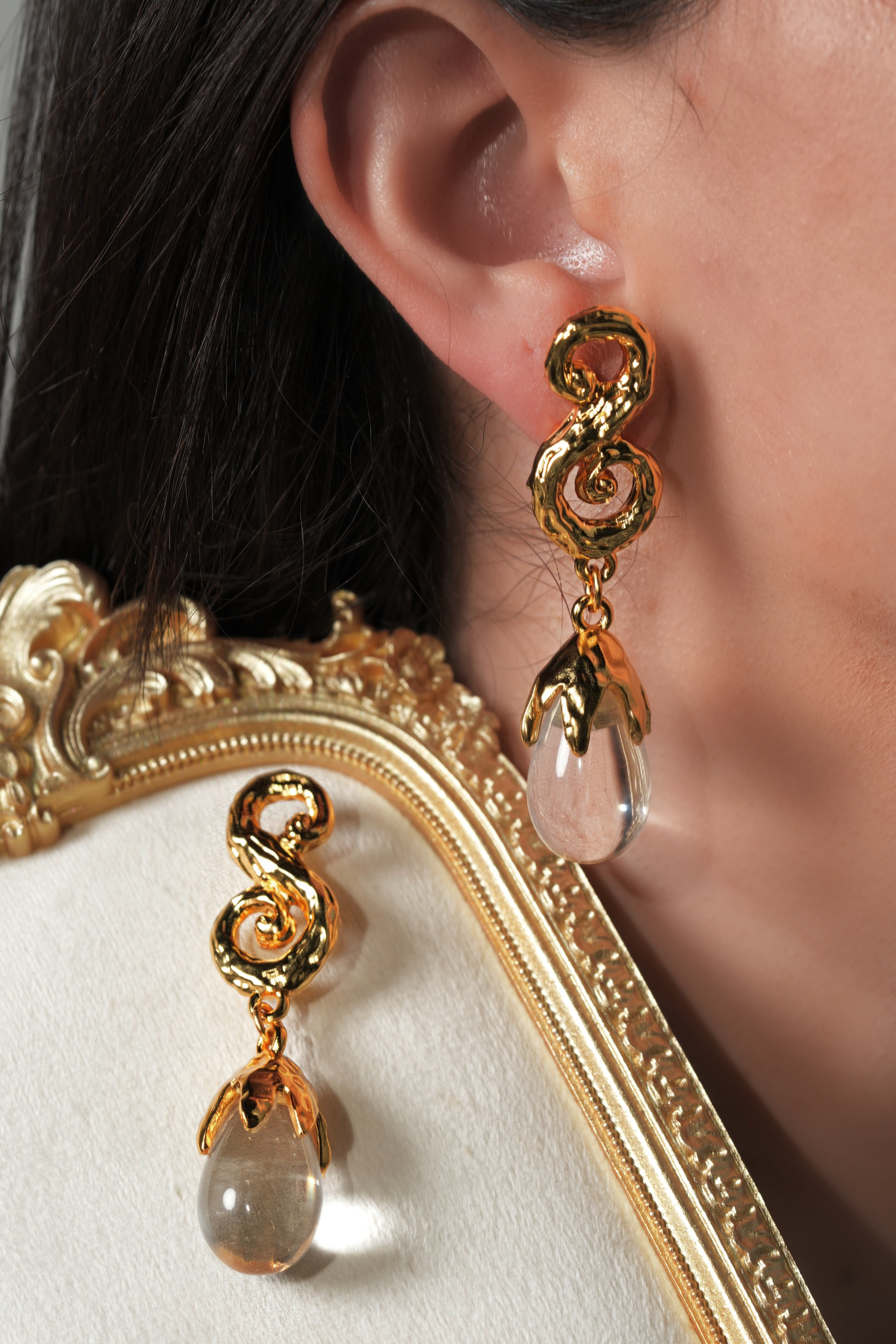 Gold plated clear rock earrings
