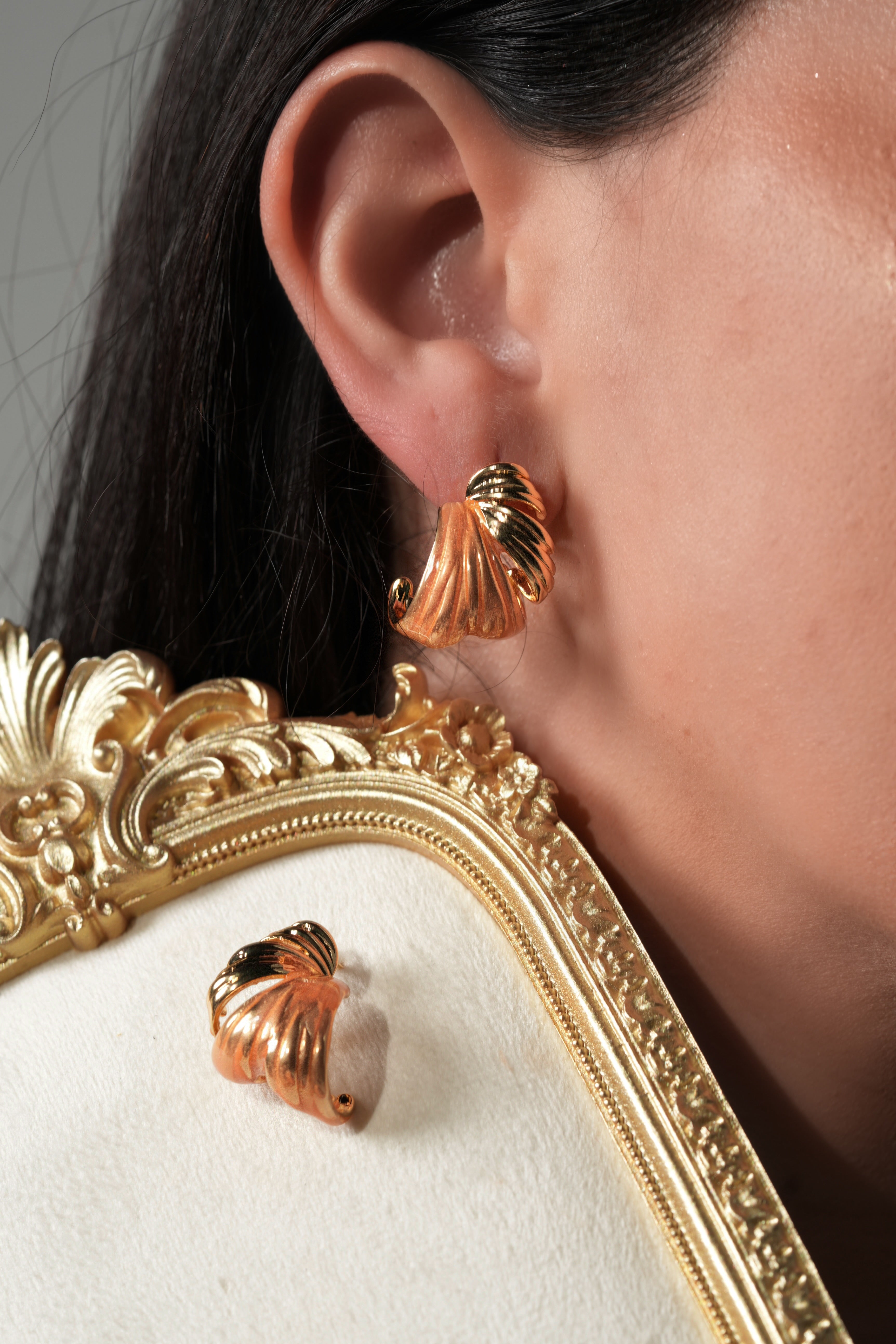 Curved orange earrings