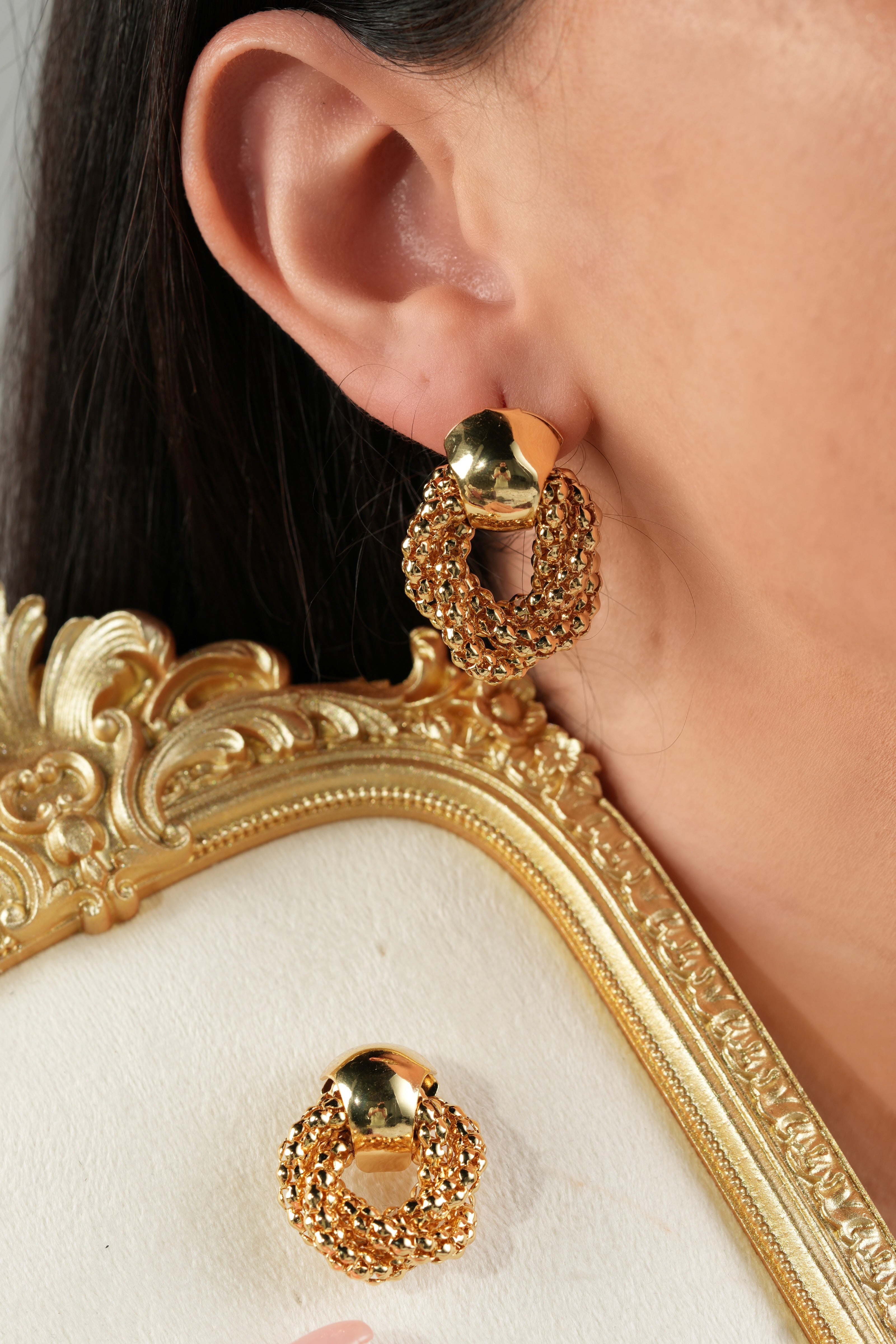 Golden circled earrings