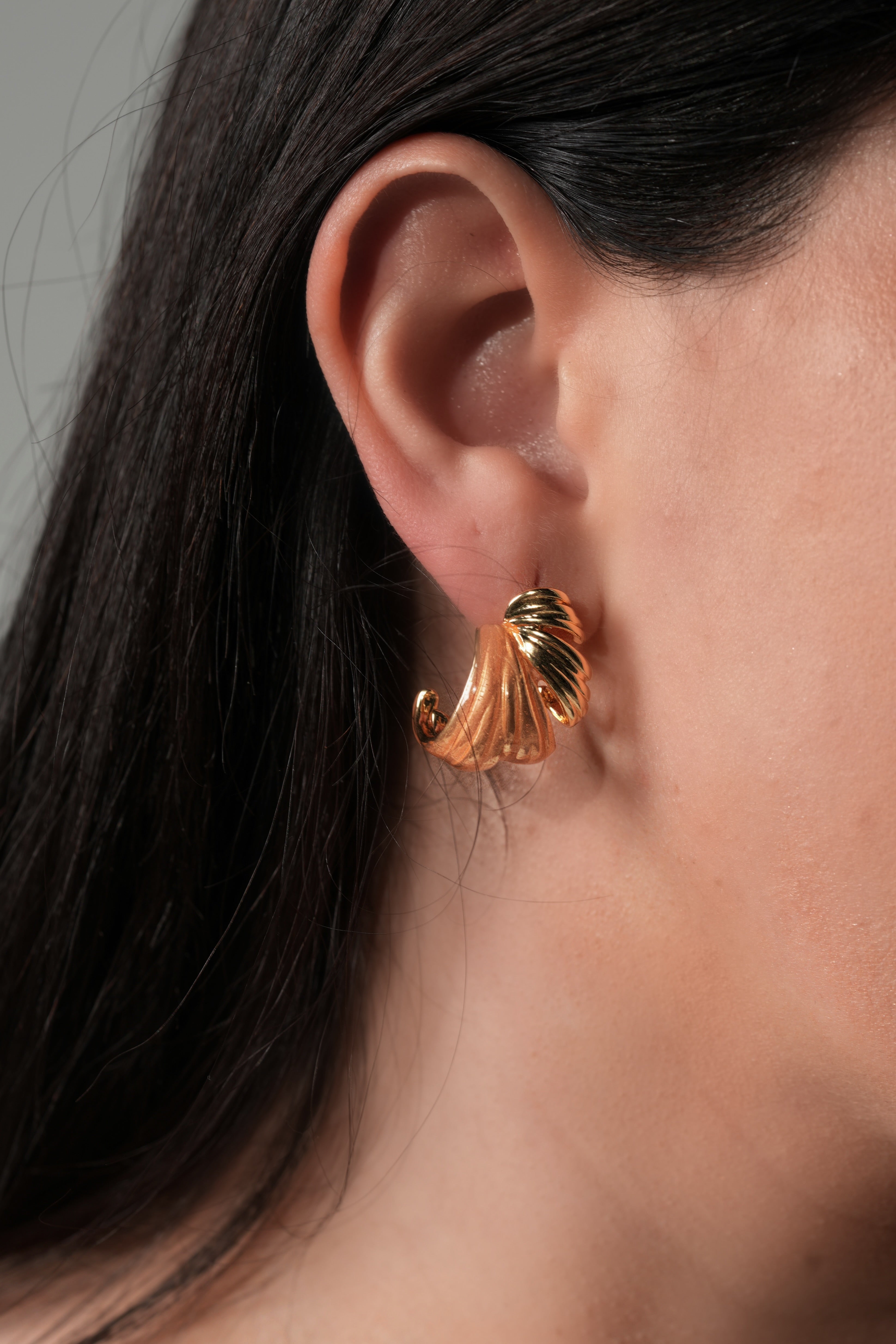 Curved orange earrings